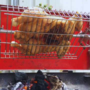 This_image_shows_Butterflied_chicken_cooked_on_Mini_Spit_roaster