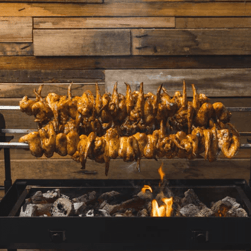 This-image-shows-cooking-on-a-charcoal-rotisserie